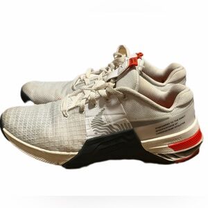 Nike White and Black Athletic Shoes with Red Accents